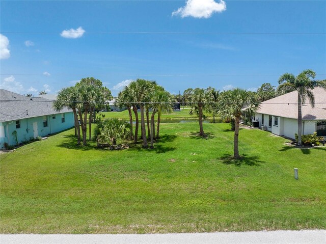 167 Marker Rd, Rotonda West, FL 33947 - view of green lawn