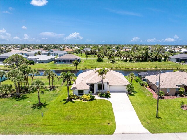 167 Marker Rd, Rotonda West, FL 33947 - aerial perspective of suburban area featuring a nearby body of water