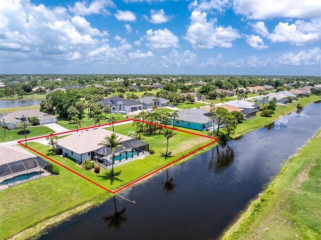 167 Marker Rd, Rotonda West, FL 33947 - aerial perspective of suburban area featuring property parcel outlined and a large body of water