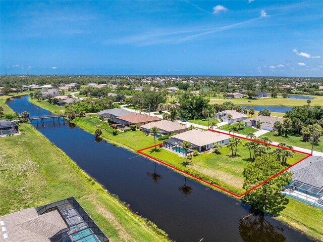 167 Marker Rd, Rotonda West, FL 33947 - aerial perspective of suburban area with a large body of water and property parcel outlined