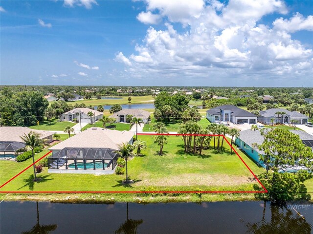 167 Marker Rd, Rotonda West, FL 33947 - aerial perspective of suburban area with a nearby body of water and property parcel outlined