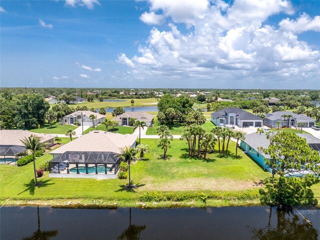 167 Marker Rd, Rotonda West, FL 33947 - aerial view of residential area featuring a nearby body of water and a pool area