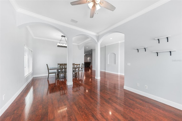 1523 Napoleon Rd, North Port, FL 34288 - dining room with ceiling fan, hardwood / wood-style flooring, crown molding, and arched walkways