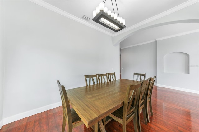 1523 Napoleon Rd, North Port, FL 34288 - dining space featuring hardwood / wood-style flooring, crown molding, a chandelier, and arched walkways
