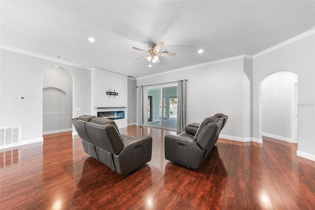 1523 Napoleon Rd, North Port, FL 34288 - living room with arched walkways, ceiling fan, wood finished floors, recessed lighting, and ornamental molding
