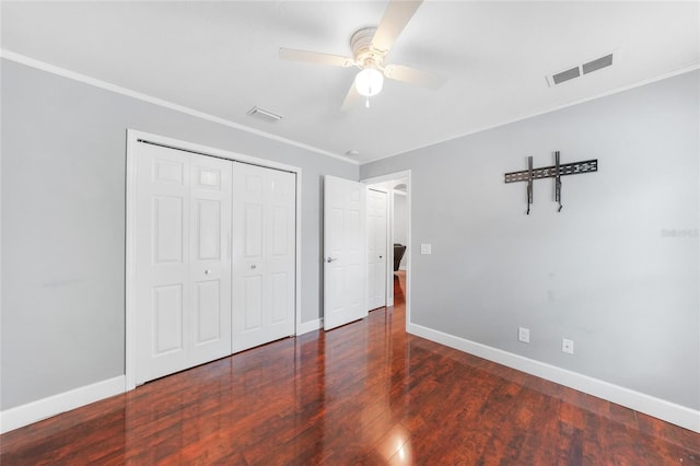 1523 Napoleon Rd, North Port, FL 34288 - unfurnished bedroom featuring ornamental molding, wood finished floors, a closet, and ceiling fan