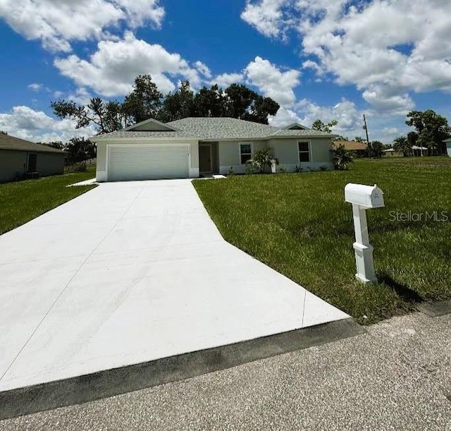 16403 Perdida Ct, Punta Gorda, FL 33955 - single story home with a garage, concrete driveway, and a front lawn