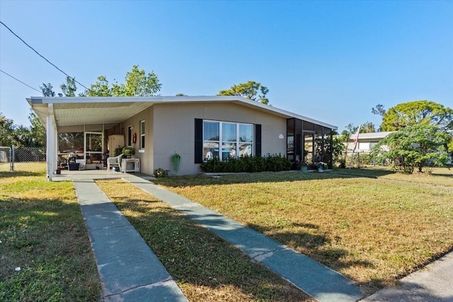 3197 Normandy Dr, Port Charlotte, FL 33952 - view of front of home with an attached carport and stucco siding
