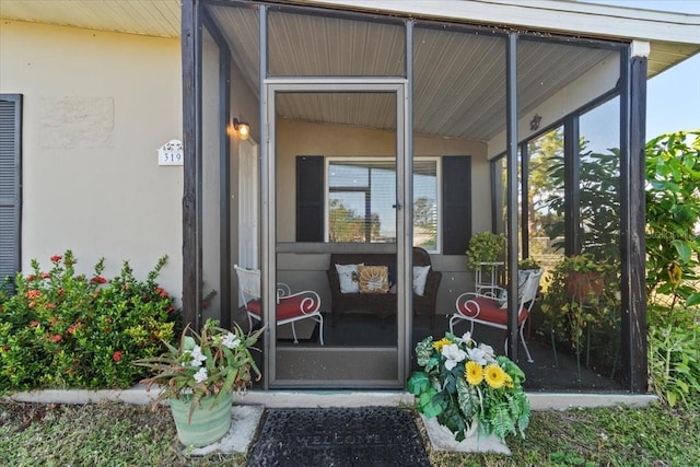 3197 Normandy Dr, Port Charlotte, FL 33952 - doorway to property featuring stucco siding