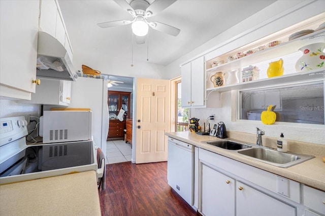 3197 Normandy Dr, Port Charlotte, FL 33952 - kitchen with white appliances, a ceiling fan, under cabinet range hood, and white cabinetry