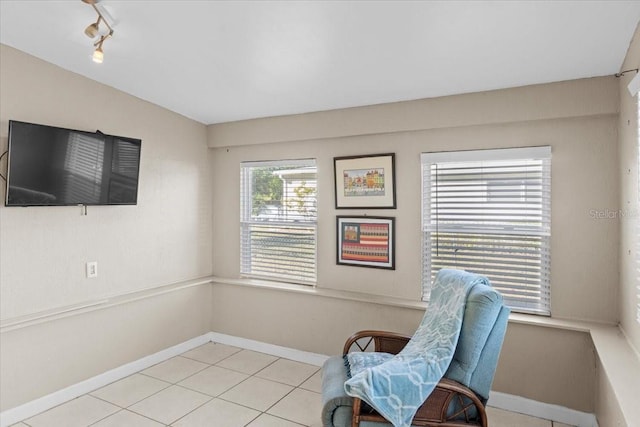 3197 Normandy Dr, Port Charlotte, FL 33952 - sitting room with light tile patterned flooring and rail lighting