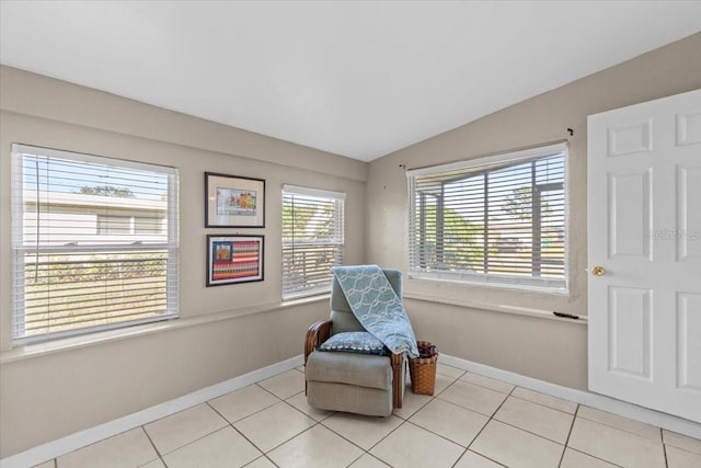 3197 Normandy Dr, Port Charlotte, FL 33952 - sitting room featuring vaulted ceiling and light tile patterned floors