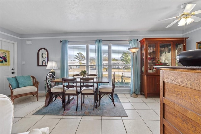 3197 Normandy Dr, Port Charlotte, FL 33952 - dining room with light tile patterned floors and a ceiling fan