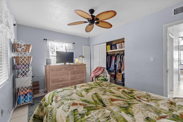 3197 Normandy Dr, Port Charlotte, FL 33952 - tiled bedroom featuring a closet and ceiling fan