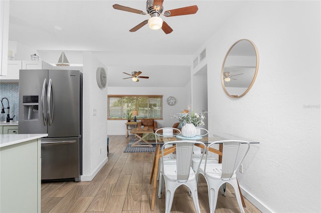 720 Dalton Blvd, Port Charlotte, FL 33952 - dining room with ceiling fan and light wood-type flooring