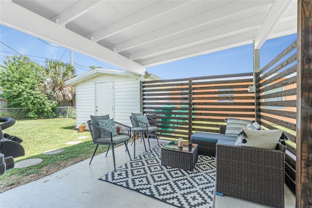 720 Dalton Blvd, Port Charlotte, FL 33952 - fenced backyard featuring a patio area, an outdoor living space, and a storage unit