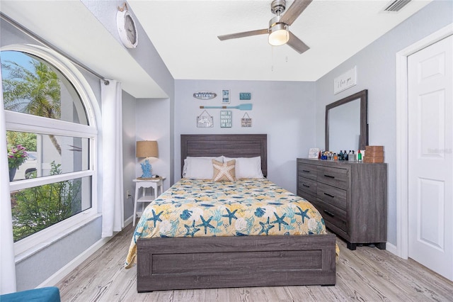 976 Great Falls Ter NW, Port Charlotte, FL 33948 - bedroom with light wood-style floors and a ceiling fan
