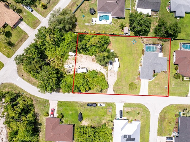 976 Great Falls Ter NW, Port Charlotte, FL 33948 - aerial perspective of suburban area with property parcel outlined
