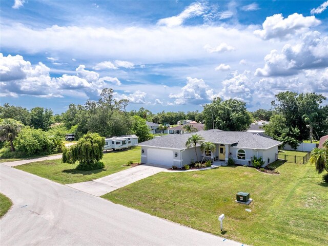 976 Great Falls Ter NW, Port Charlotte, FL 33948 - single story home featuring concrete driveway and a garage