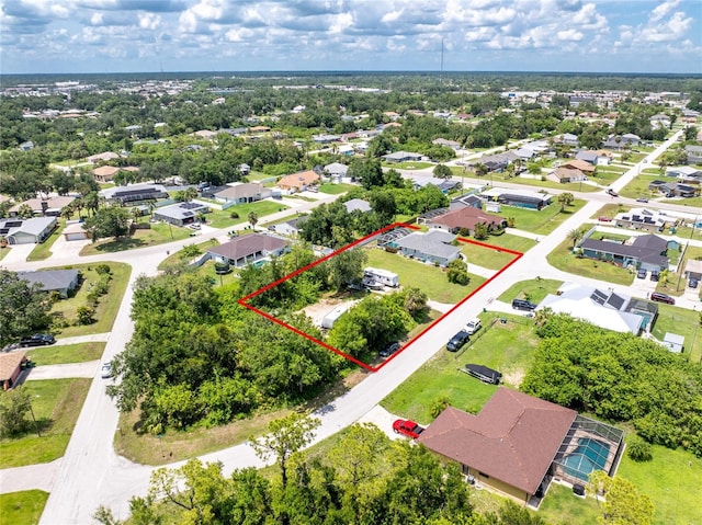 976 Great Falls Ter NW, Port Charlotte, FL 33948 - aerial perspective of suburban area with property boundaries highlighted