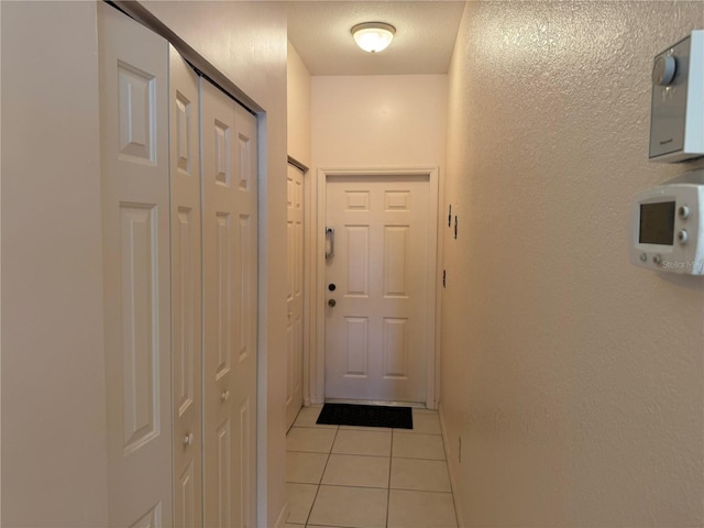 1625 Red Oak Ln, Port Charlotte, FL 33948 - entryway with light tile patterned flooring