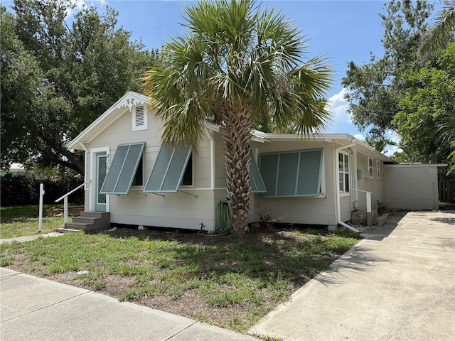 420 W Olympia Ave, Punta Gorda, FL 33950 - view of front of home with entry steps and driveway