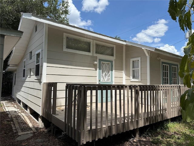 420 W Olympia Ave, Punta Gorda, FL 33950 - rear view of house with a wooden deck
