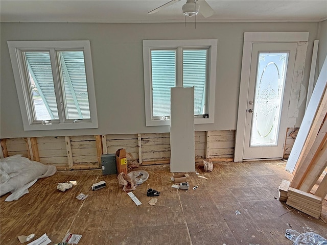 420 W Olympia Ave, Punta Gorda, FL 33950 - entryway with plenty of natural light, a ceiling fan, crown molding, and wood-type flooring