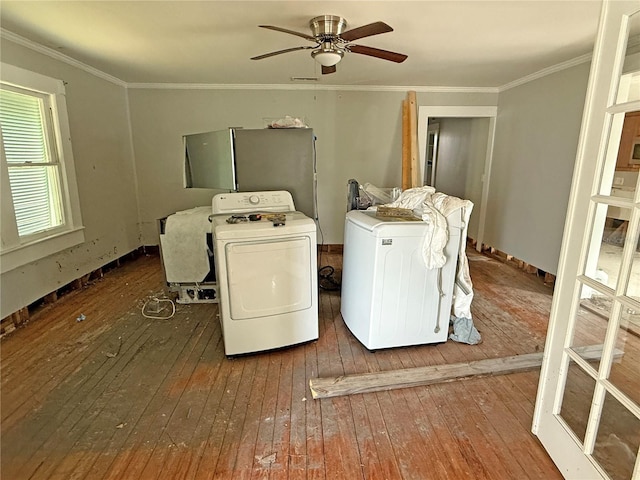 420 W Olympia Ave, Punta Gorda, FL 33950 - laundry area with washer and clothes dryer, hardwood / wood-style floors, ceiling fan, and ornamental molding