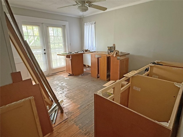 420 W Olympia Ave, Punta Gorda, FL 33950 - misc room featuring ornamental molding, light wood-type flooring, and a ceiling fan