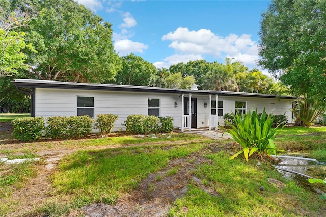 4996 49th St, Vero Beach, FL 32967 - view of single story home