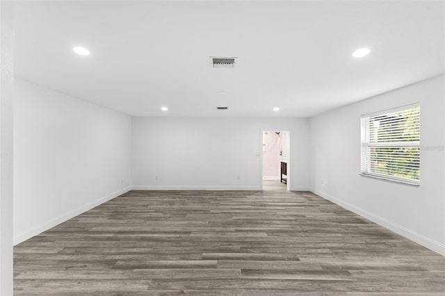 4996 49th St, Vero Beach, FL 32967 - spare room featuring recessed lighting and wood finished floors