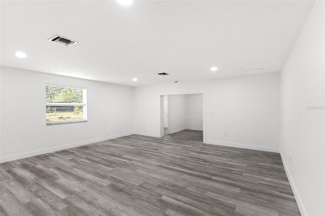 4996 49th St, Vero Beach, FL 32967 - empty room with recessed lighting and wood finished floors
