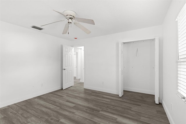 4996 49th St, Vero Beach, FL 32967 - unfurnished bedroom with wood finished floors, a closet, and ceiling fan