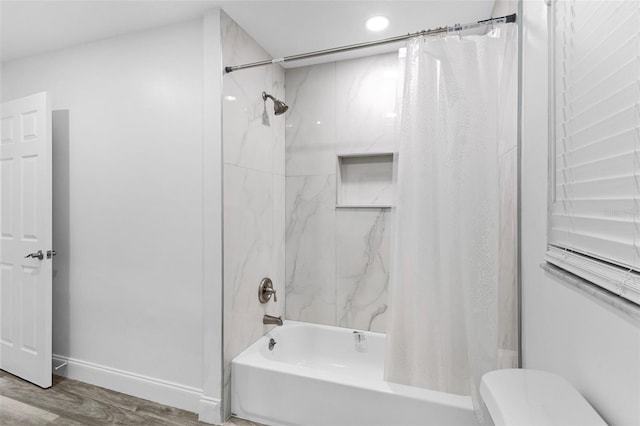 4996 49th St, Vero Beach, FL 32967 - bathroom with shower / bathtub combination with curtain, wood finished floors, and recessed lighting