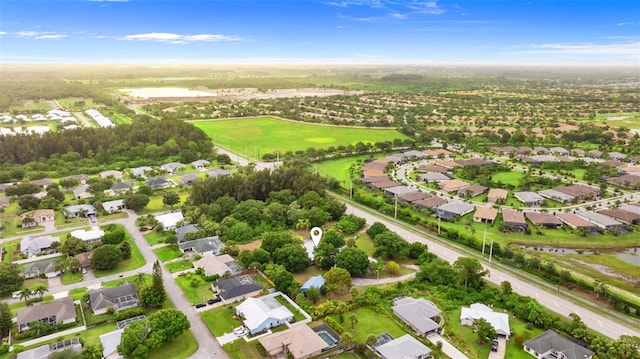 4996 49th St, Vero Beach, FL 32967 - aerial view of property and surrounding area featuring nearby suburban area