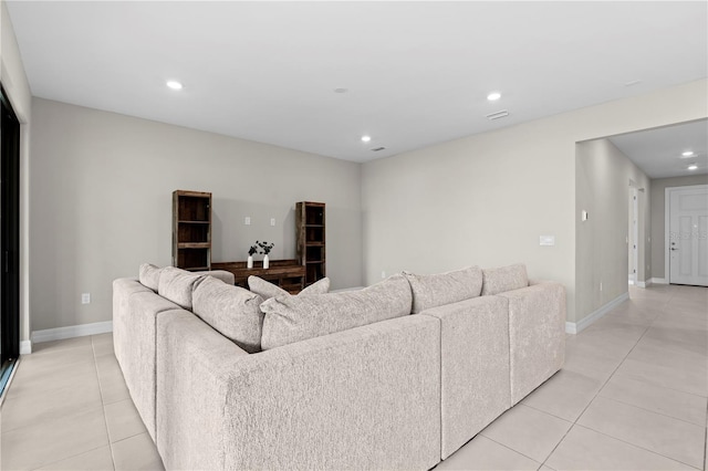 2477 Gabel Oak Dr, North Port, FL 34289 - living room featuring light tile patterned floors and recessed lighting