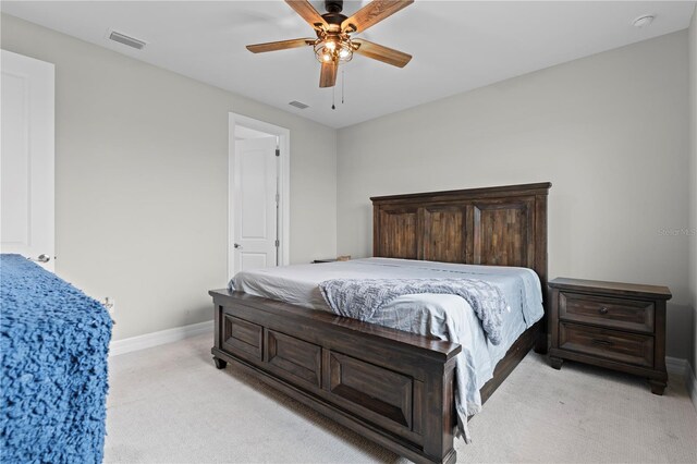 2477 Gabel Oak Dr, North Port, FL 34289 - bedroom featuring light colored carpet and ceiling fan
