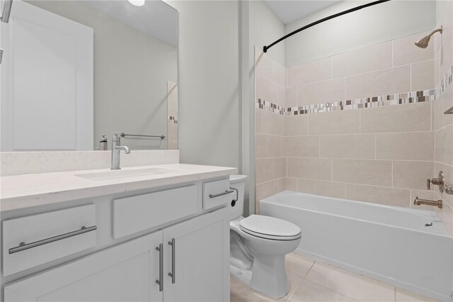 2477 Gabel Oak Dr, North Port, FL 34289 - full bath with vanity, shower / washtub combination, and tile patterned flooring