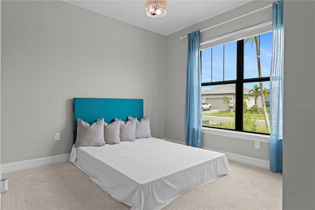 2477 Gabel Oak Dr, North Port, FL 34289 - bedroom featuring carpet flooring and multiple windows
