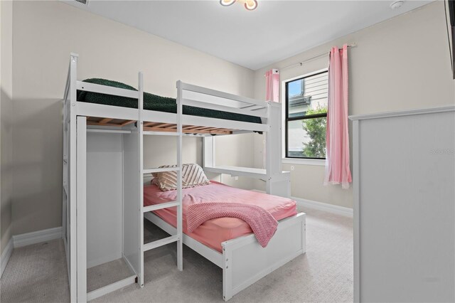 2477 Gabel Oak Dr, North Port, FL 34289 - carpeted bedroom featuring baseboards