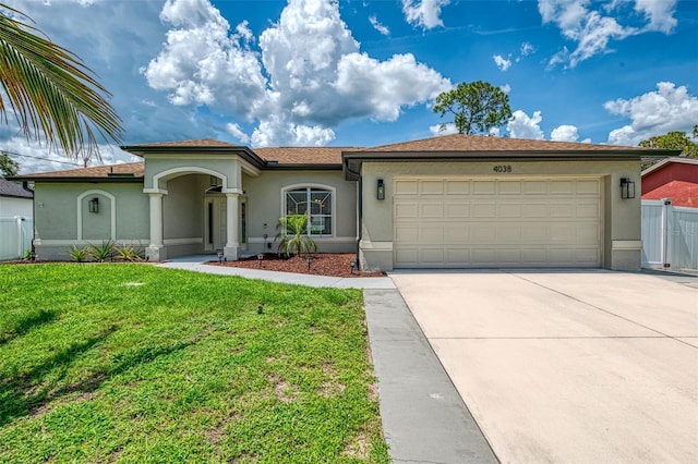 4038 Corydon Ave, North Port, FL 34286 - view of front of house featuring stucco siding, a garage, and concrete driveway