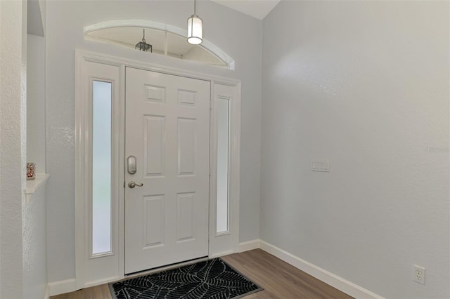 4038 Corydon Ave, North Port, FL 34286 - entryway with wood finished floors and baseboards