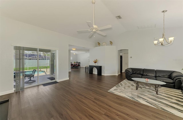 4038 Corydon Ave, North Port, FL 34286 - living area with ceiling fan, dark wood-type flooring, lofted ceiling, and a chandelier