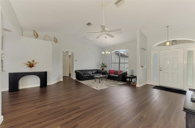 4038 Corydon Ave, North Port, FL 34286 - foyer featuring arched walkways, ceiling fan, dark wood finished floors, lofted ceiling, and a chandelier