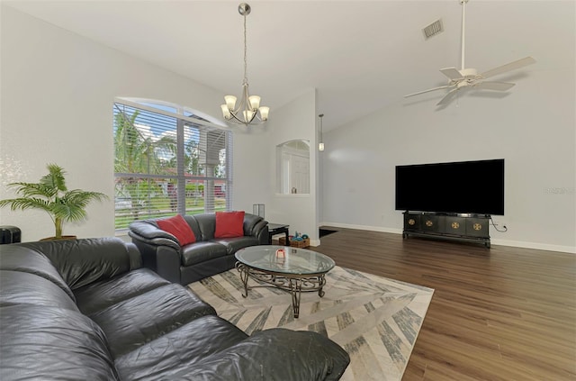 4038 Corydon Ave, North Port, FL 34286 - living room featuring wood finished floors, a chandelier, a ceiling fan, and vaulted ceiling