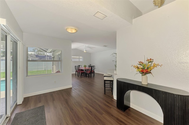 4038 Corydon Ave, North Port, FL 34286 - hallway featuring wood finished floors and baseboards