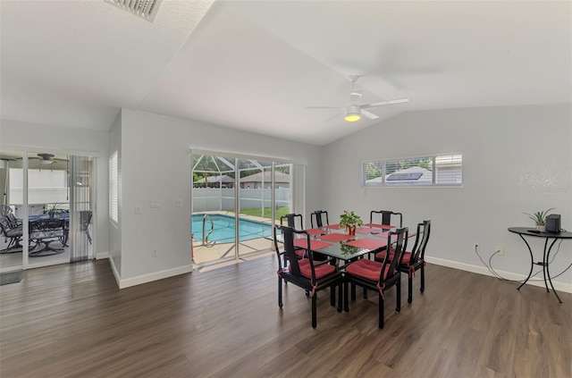 4038 Corydon Ave, North Port, FL 34286 - dining room featuring ceiling fan, vaulted ceiling, dark wood-style floors, and healthy amount of natural light