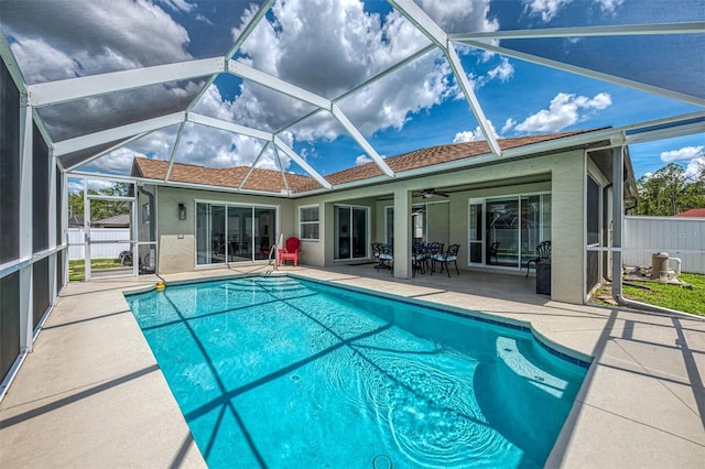 4038 Corydon Ave, North Port, FL 34286 - view of swimming pool with a patio, ceiling fan, and a lanai
