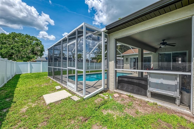 4038 Corydon Ave, North Port, FL 34286 - view of pool featuring a fenced backyard, a ceiling fan, and a lanai